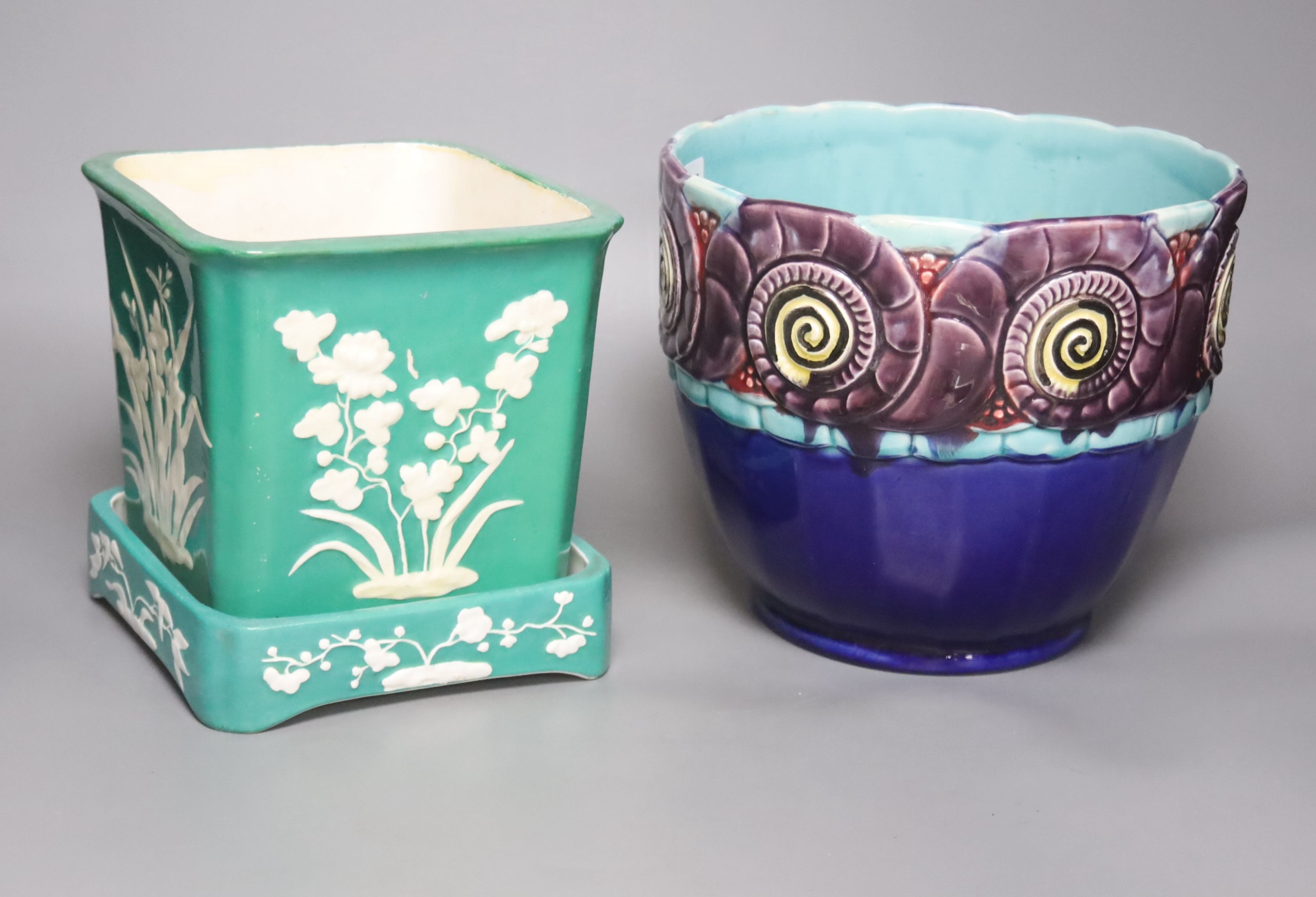 An Orchies majolica jardiniere and a Minton green glazed flower pot and stand